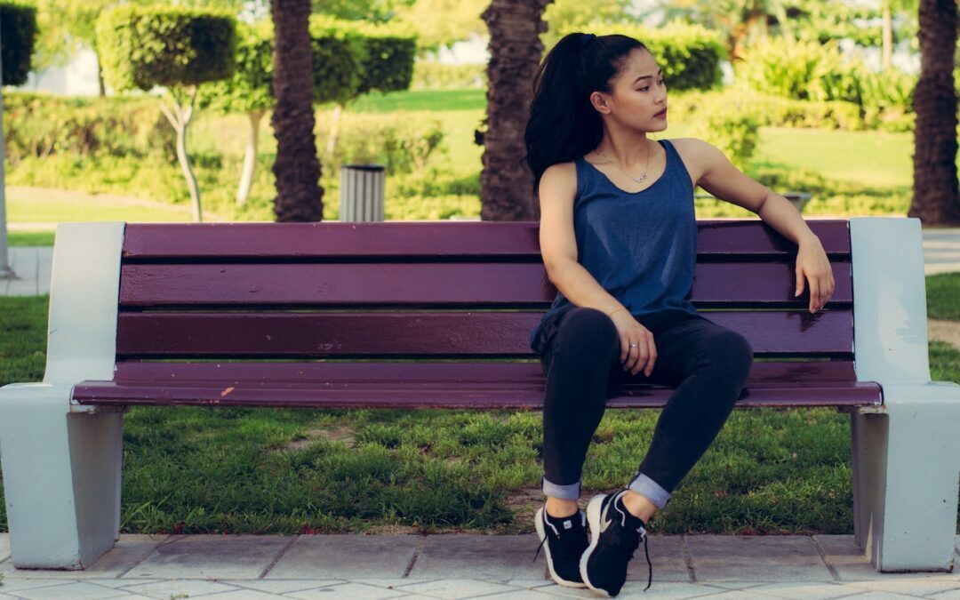 woman sitting on bench